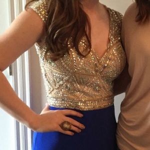 Royal blue gown with gold beading